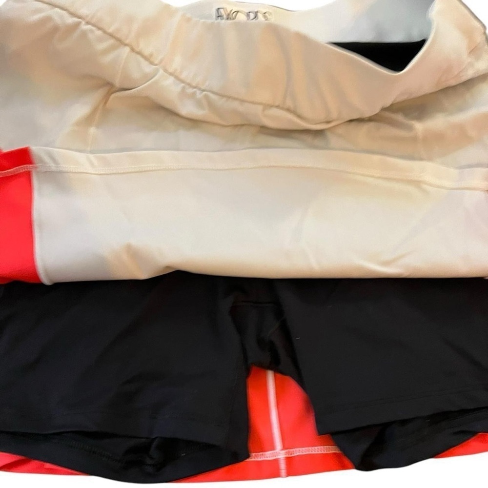 Orange and white tennis skirt with shorts underneath #tennisskirt #skort
-866 - Picture 5 of 8